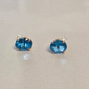 One Pair of 14KT yellow gold and topaz earrings.
